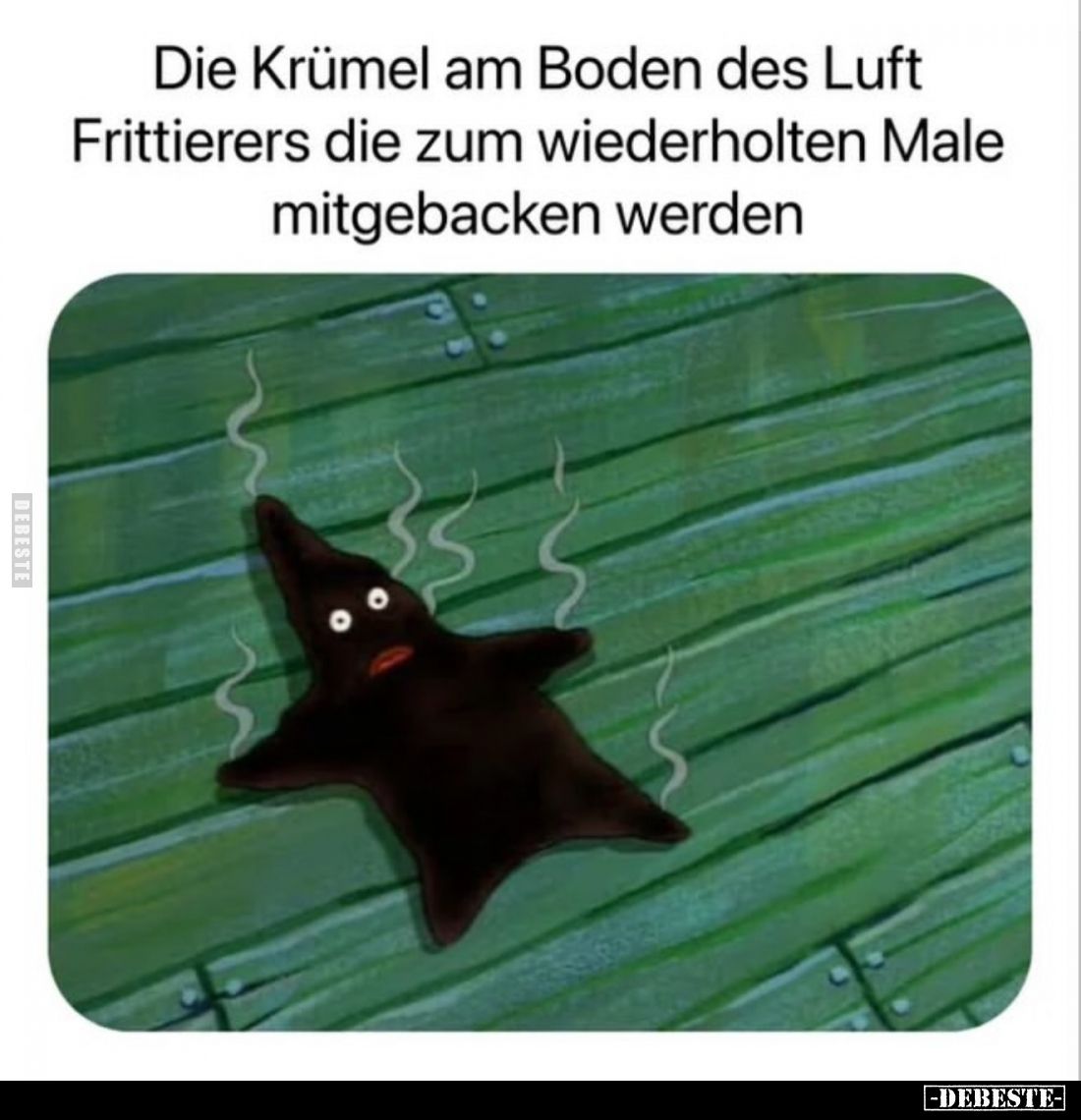 Die Krümel am Boden des Luft Frittierers die zum wiederholten Male mitgebacken werden.