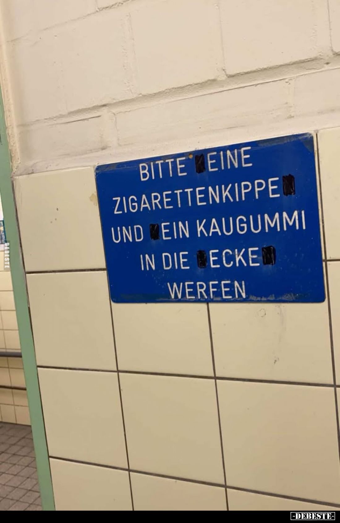 Bitte eine Zigarettenkippe und ein Kaugummi in die Ecke werfen.