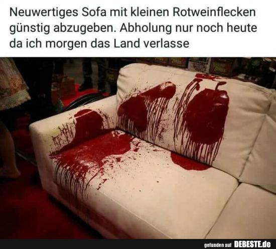 Neuwertiges Sofa mit kleinen Rotweinflecken..