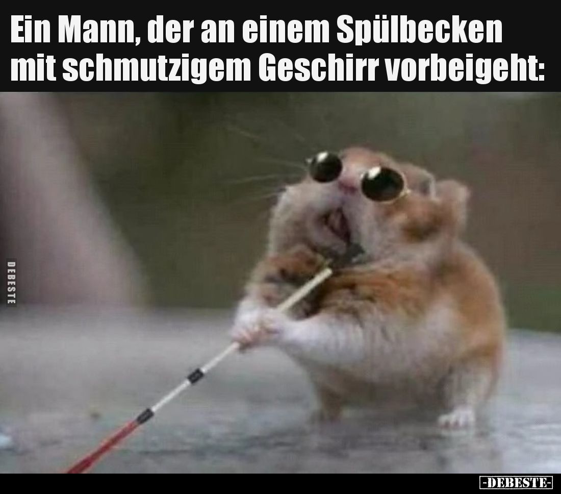 Ein Mann, der an einem Spülbecken mit schmutzigem Geschirr vorbeigeht: